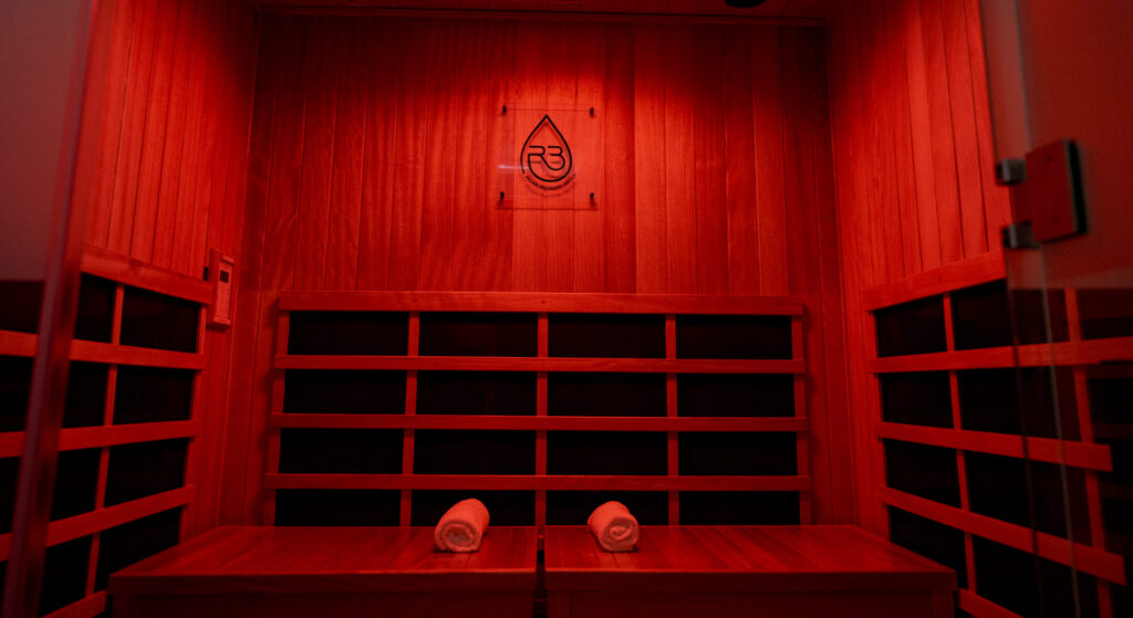 Empty red-lit R3 sauna interior